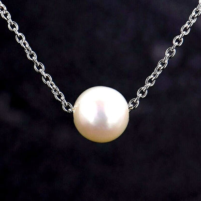 Tasaki pearl necklace with a single 6.4mm silver pearl on a 41cm adjustable silver chain