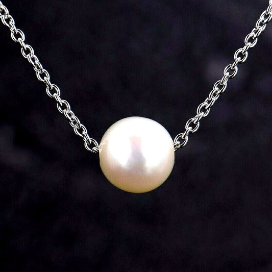 Tasaki pearl necklace with a single 6.4mm silver pearl on a 41cm adjustable silver chain