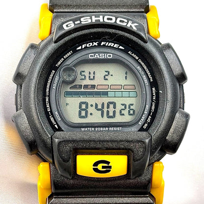 Casio G-Shock DW-003 men's digital quartz watch in yellow and black with water resistant and shockproof features