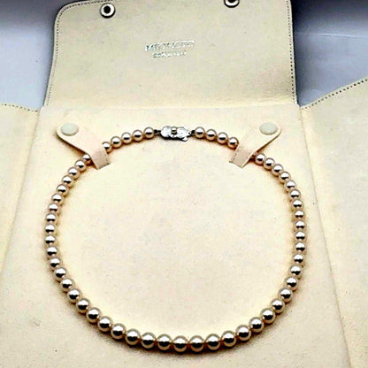 MIKIMOTO Necklace featuring 7mm pearls measuring 43 cm in length with a polished finish