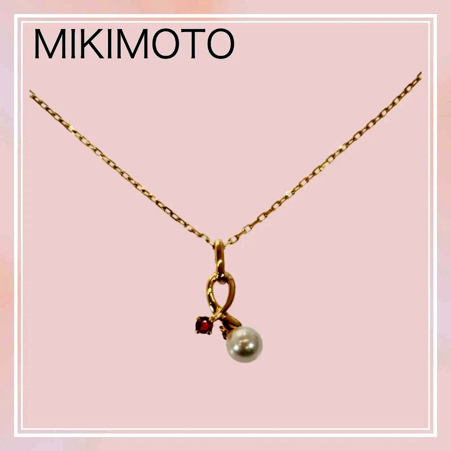 Mikimoto 18K yellow gold pendant necklace with ruby and 5.1mm Akoya pearl on 38cm chain displayed with box