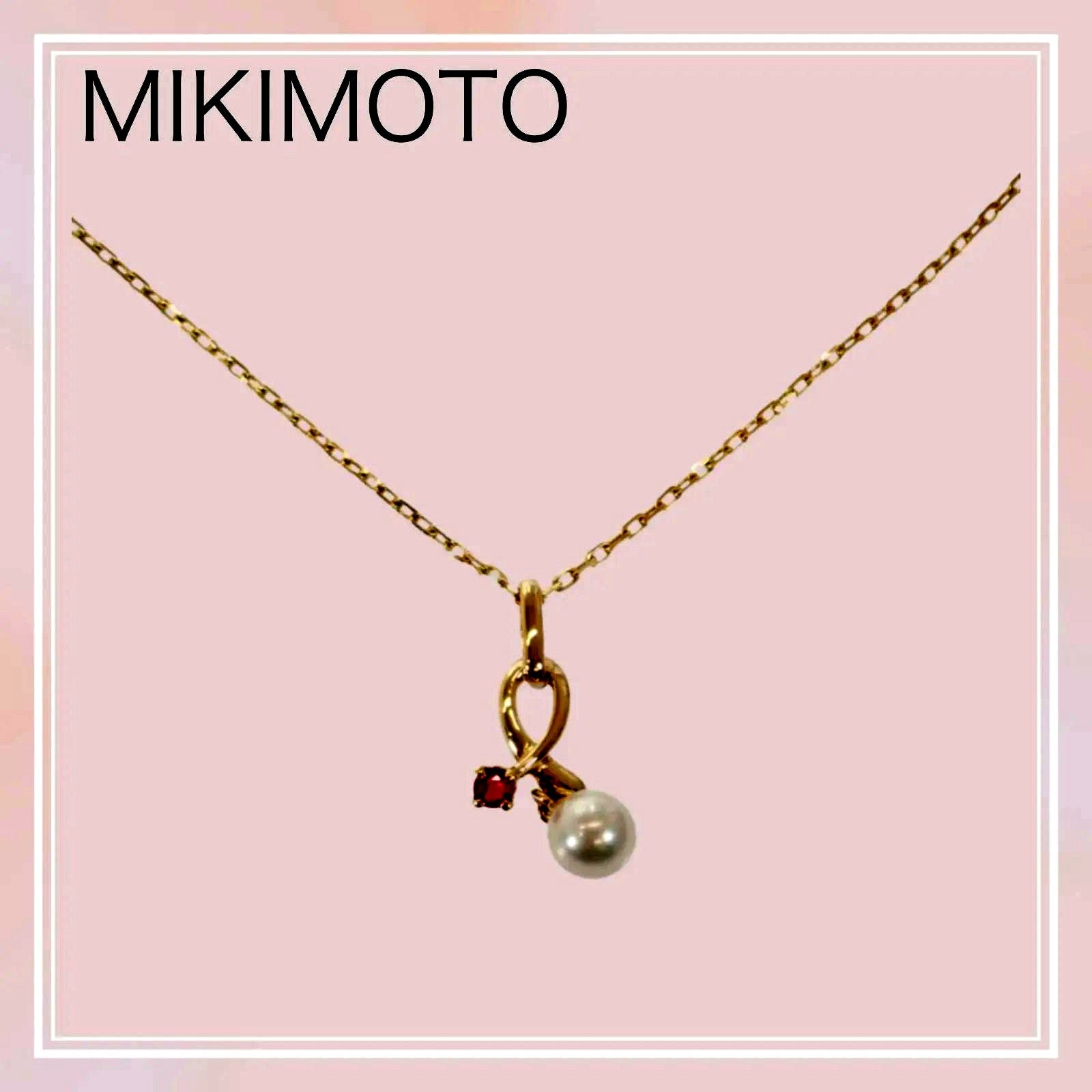 Mikimoto 18K yellow gold pendant necklace with ruby and 5.1mm Akoya pearl on 38cm chain displayed with box