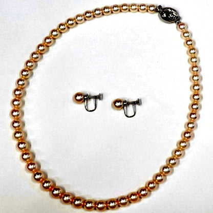 Tasaki Akoya pearl gradient necklace approximately 41cm with matching pearl earrings and silver clasp