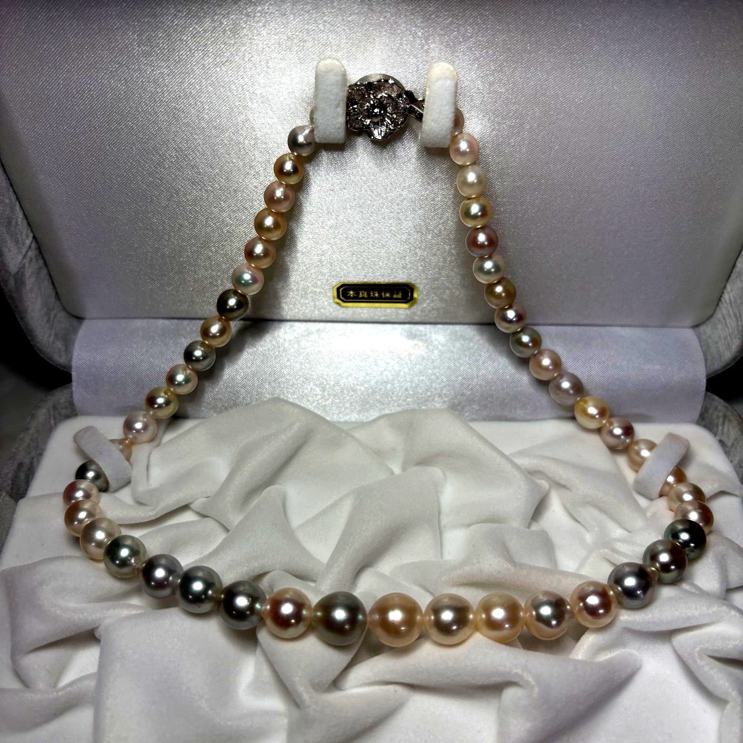 Akoya genuine pearl necklace with multi-gradient 6-10mm narrow drop pearls and silver fittings on a 43cm chain
