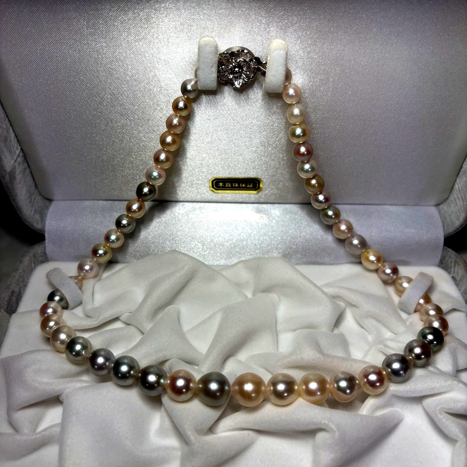 Akoya genuine pearl necklace with multi-gradient 6-10mm narrow drop pearls and silver fittings on a 43cm chain