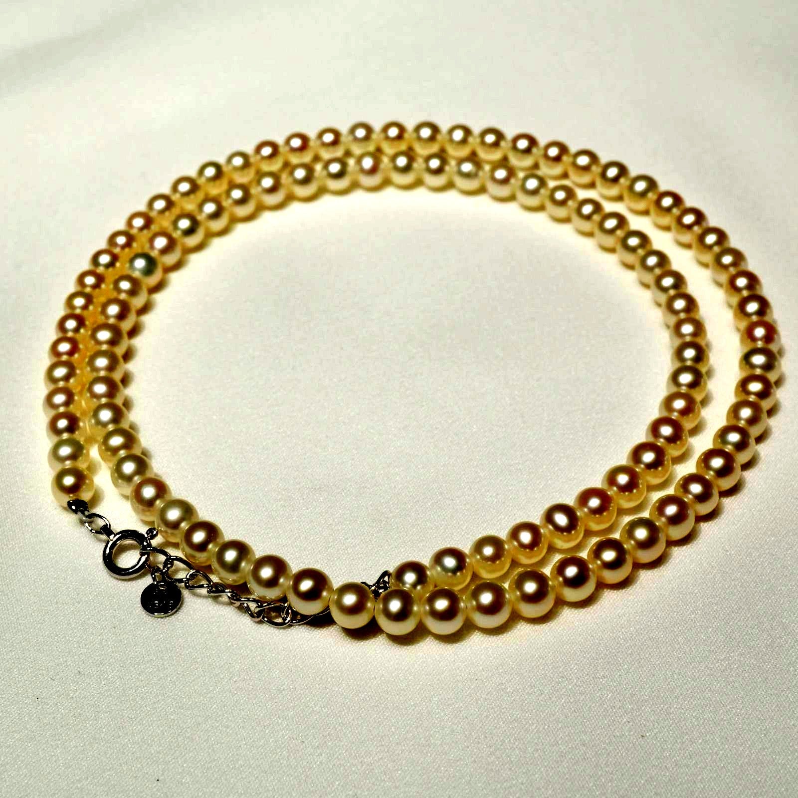 Mikimoto Baby Pearl Necklace in white gold K18WG featuring delicate pearls on a fine chain