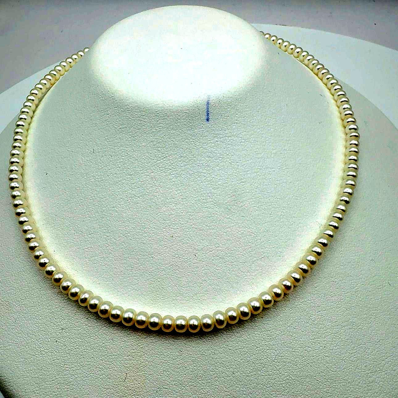 MIKIMOTO freshwater pearl necklace with 3x5mm pearls and K18 gold clasp measuring 42cm in length