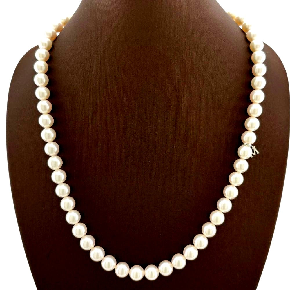 Mikimoto silver pearl necklace for ladies with elegant design, weighing 32.7 grams