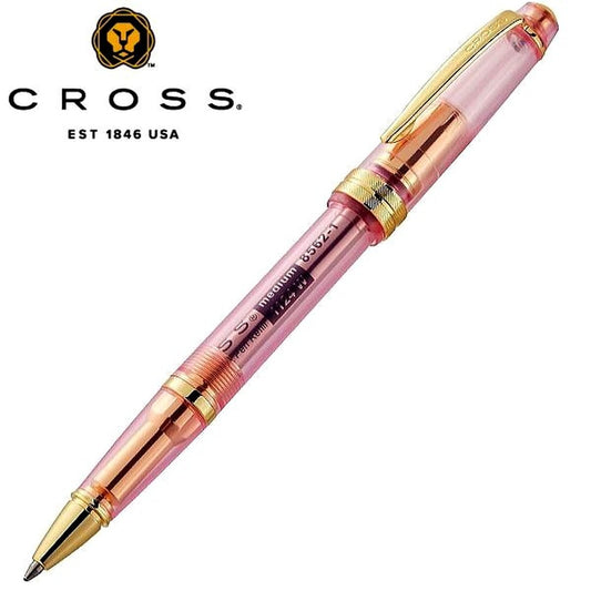 CROSS Bailey Light Cream Soda ballpoint pen in light cream with strawberry accents, capped and shown writing