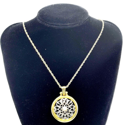 Mikimoto Loupe Pendant Necklace featuring a pearl magnifier on a 64 chain with moderate scratches