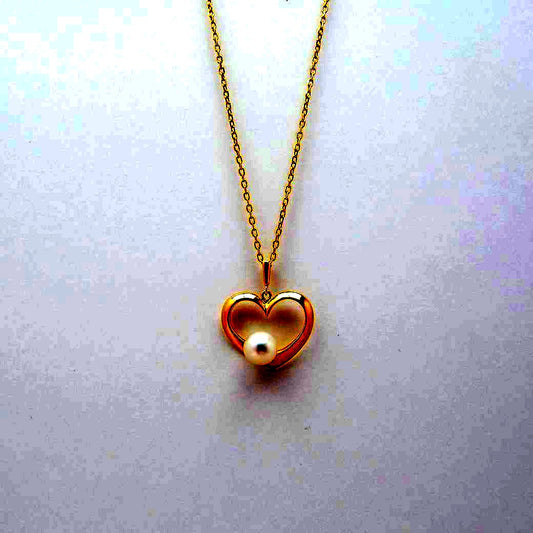 Mikimoto Heart Motif Akoya pearl pendant necklace with 6.2mm pearl in 18K yellow gold on a 40cm chain