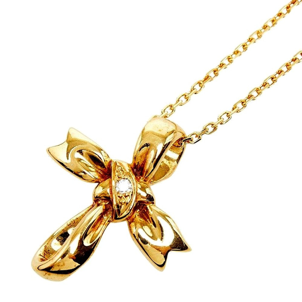 Mikimoto Cross Ribbon one-piece yellow gold necklace with small diamond pendant on 40cm chain