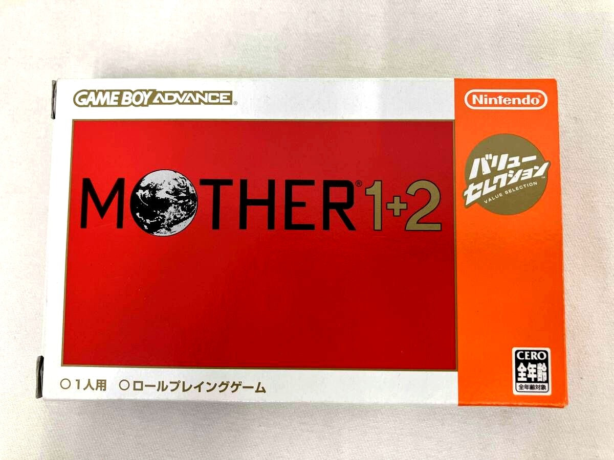 MOTHER1+2 Value Selection Reissue game discs with all included accessories displayed