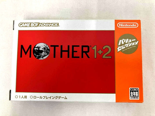 MOTHER1+2 Value Selection Reissue game discs with all included accessories displayed