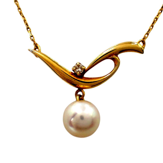 MIKIMOTO 7.2mm Akoya pearl necklace with diamond leaf pendant in 18K yellow gold on 42cm chain