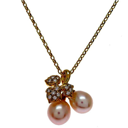 Mikimoto necklace in K18 yellow gold with 40 cm chain and 16.3 mm top width displayed on white background