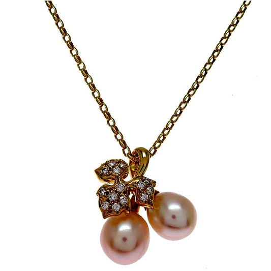 Mikimoto necklace in K18 yellow gold with 40 cm chain and 16.3 mm top width displayed on white background