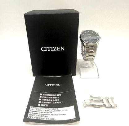 Citizen Eco-Drive men's watch with black dial and stainless steel bracelet model E031-S103720