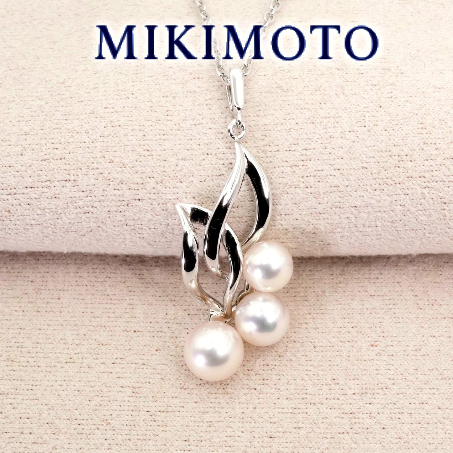 Mikimoto baby pearl silver necklace model 26-0306 with delicate silver chain and lustrous pearl pendant