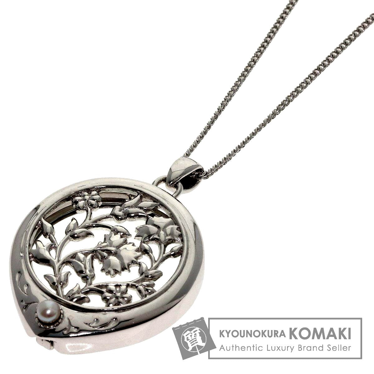 MIKIMOTO pearl necklace with metal chain and attached loupe, detailed close-up view