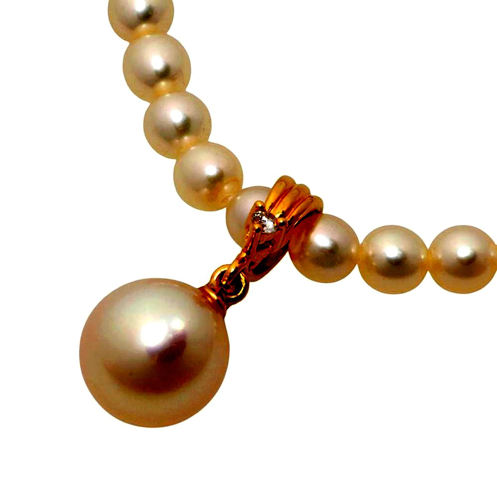 Tasaki pearl necklace with 18k yellow gold chain, freshwater Akoya pearls, and small melee diamonds