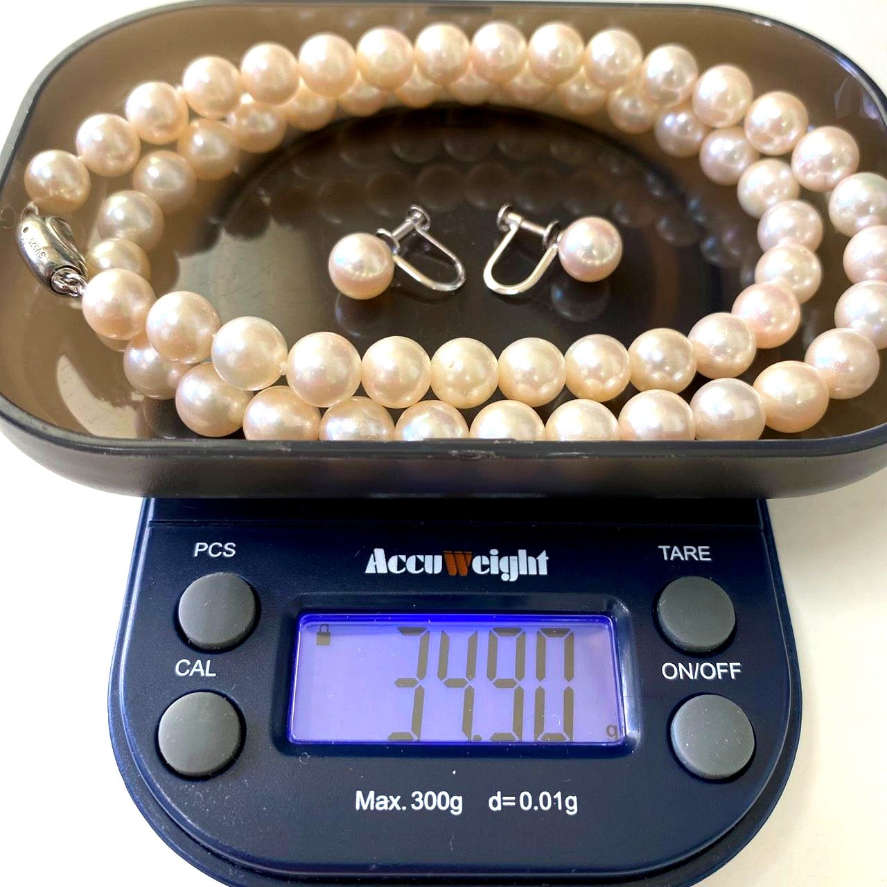 Akoya pearl necklace and earrings set with 7.0-7.32mm pearls on silver 925 and K14WG settings