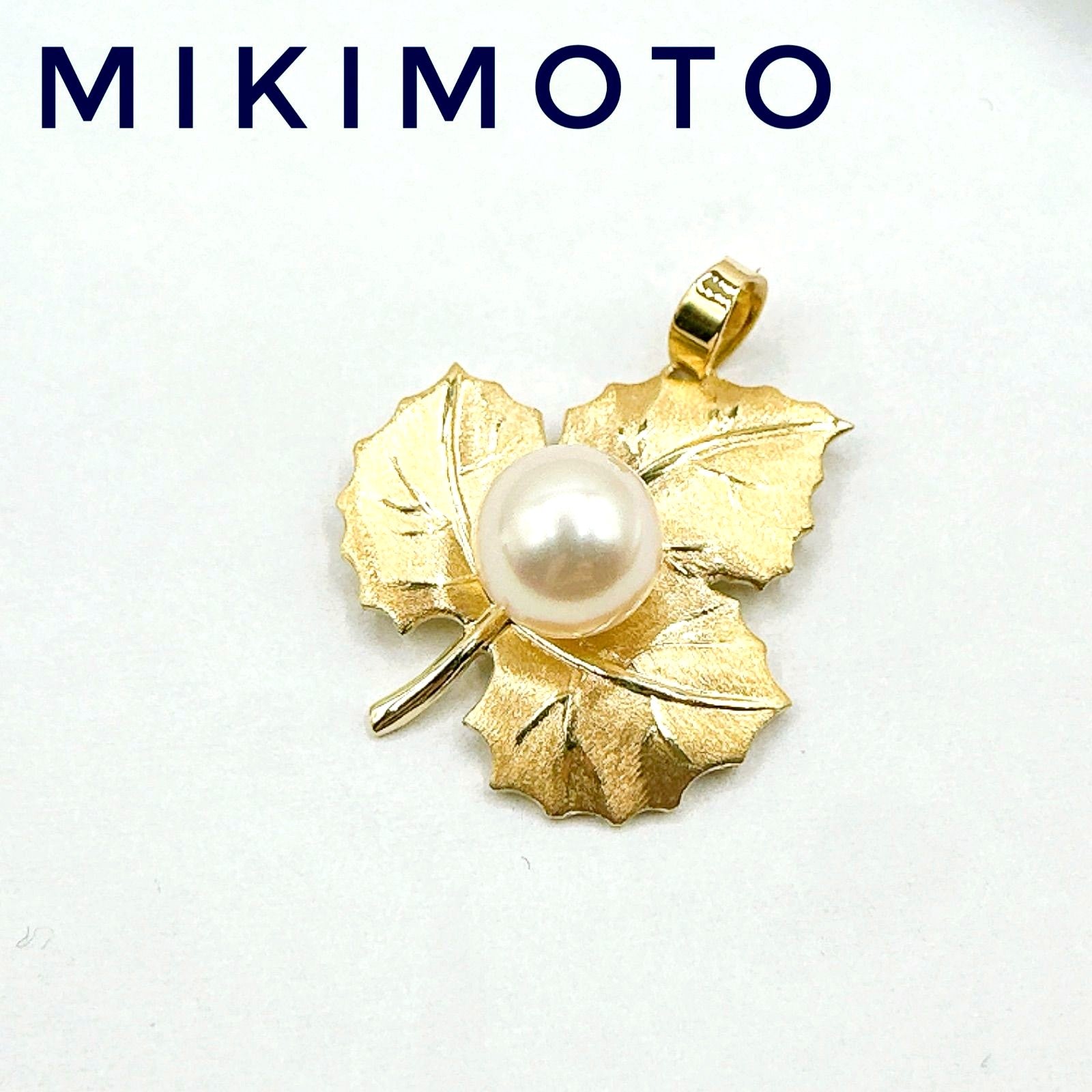 MIKIMOTO yellow gold pendant with 7.0mm pearl, size 18.6cm width by 21.3cm height, weighing 2.7 grams