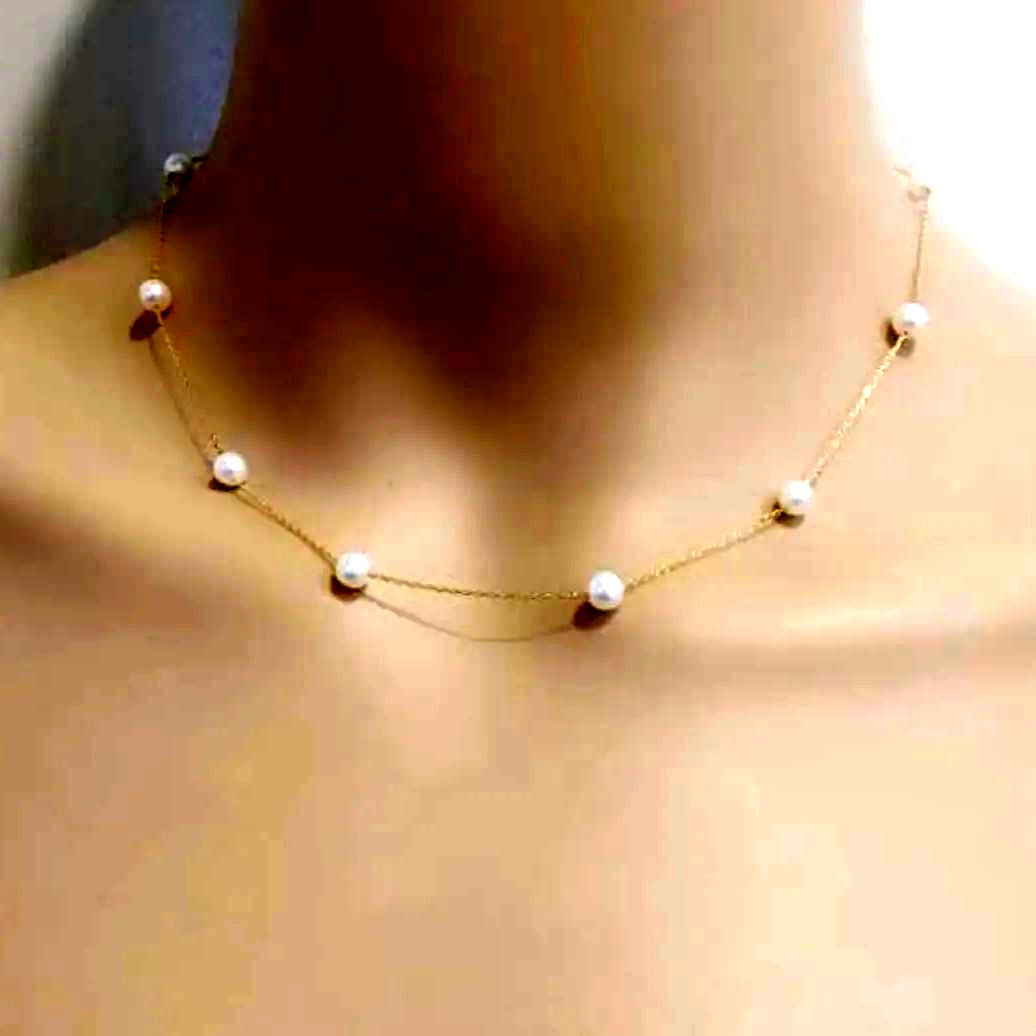 Akoya pearl necklace with white round pearls, 18k gold, 18 inches long