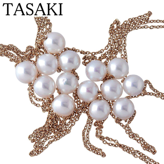 Tasaki long pearl necklace with 14 Akoya pearls sized 5.5 to 5.8mm on 18K yellow gold chain 100cm