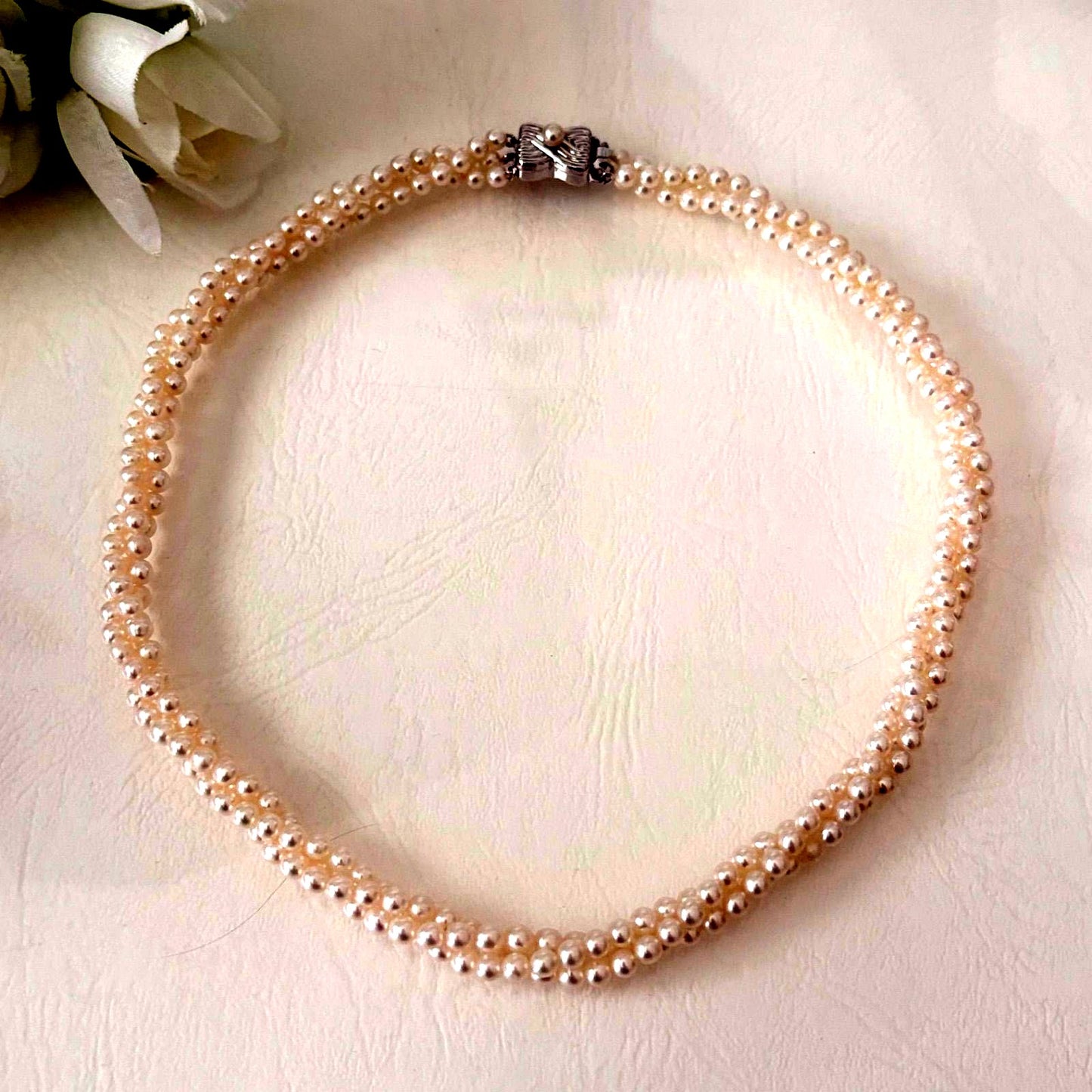 188 Tasaki silver three-row necklace featuring baby pearls and a ribbon clasp, 42.5 cm length
