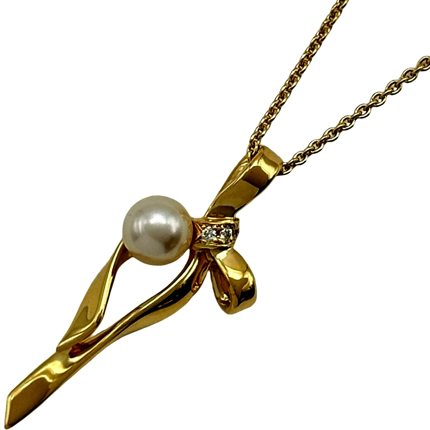 Mikimoto gold K18 ribbon necklace with pearl and diamond details on a white background