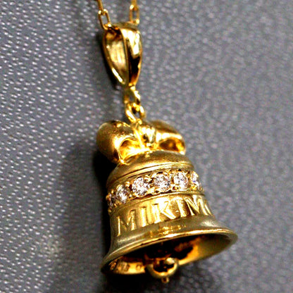 Mikimoto K18 diamond pendant featuring bell motif with 0.15ct diamond on 40cm chain