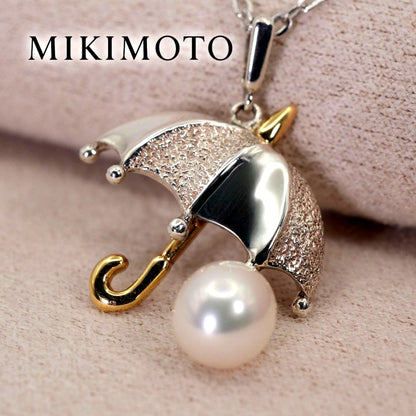 Mikimoto Umbrella Necklace made of silver, K18 gold, and pearl shown on a white background