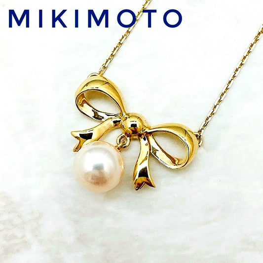 MIKIMOTO 7.2mm pearl necklace with yellow gold ribbon pendant, approximately 40cm length