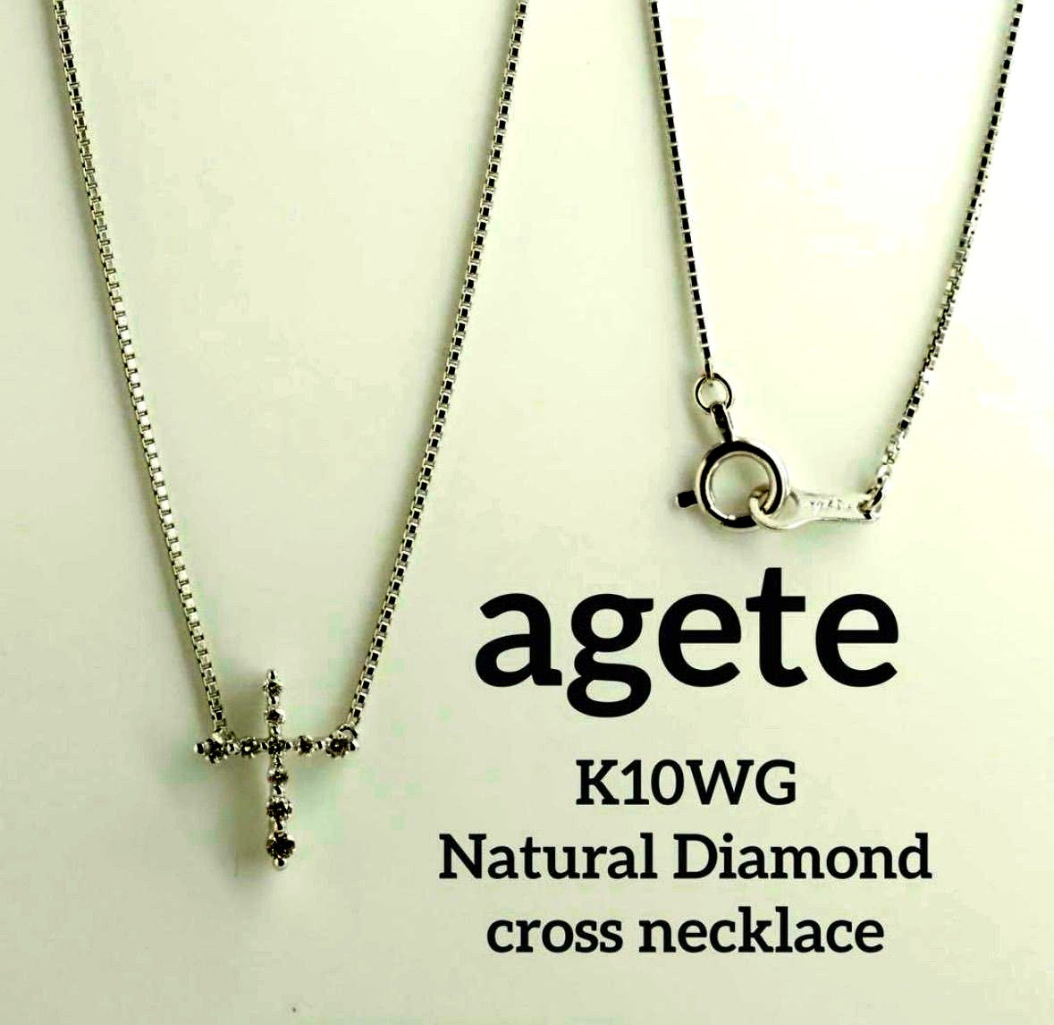 Agete Law K10WG diamond cross necklace in 10 karat white gold with pouch