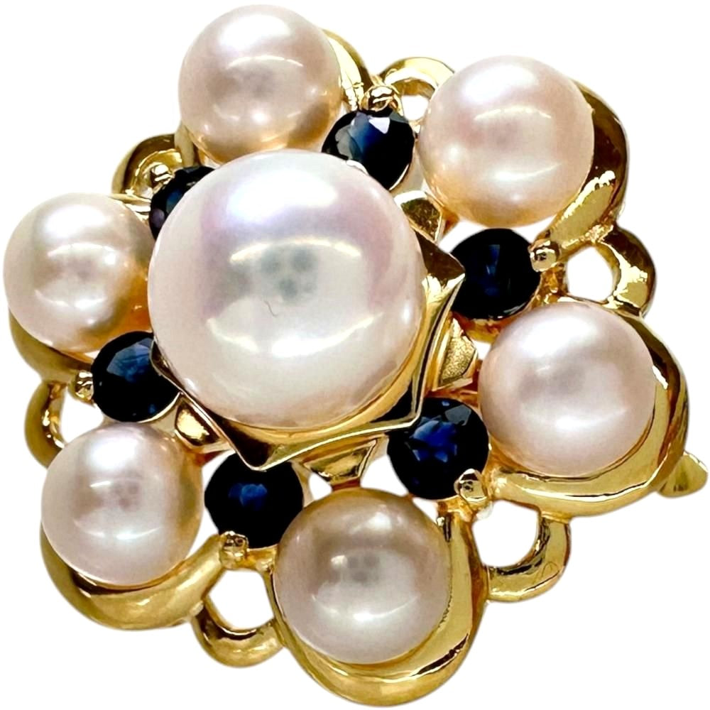 Akoya pearl and sapphire pendant top set in 18k gold with a 6.8 mm pearl and sapphire stones