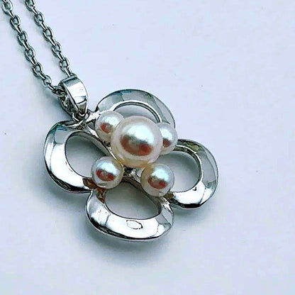 MIKIMOTO silver necklace with 2 cm pendant and 6-3 mm pearls on a 41 cm chain