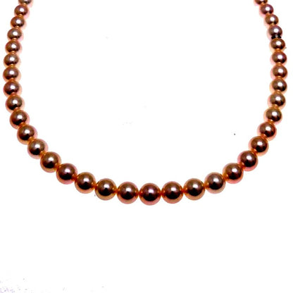 Mikimoto pearl necklace with 7 to 7.5 mm pearls and 43 cm length displayed on a white background