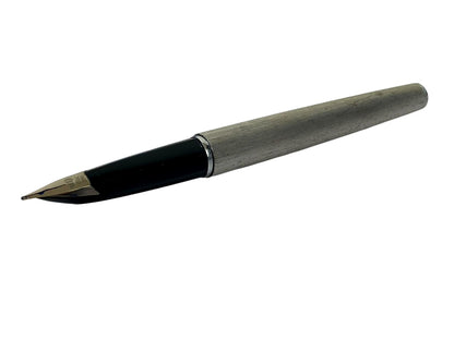 Waterman 18K 750 Mark French silver pen nib, 13.5 cm long, showing signs of wear and ink depletion