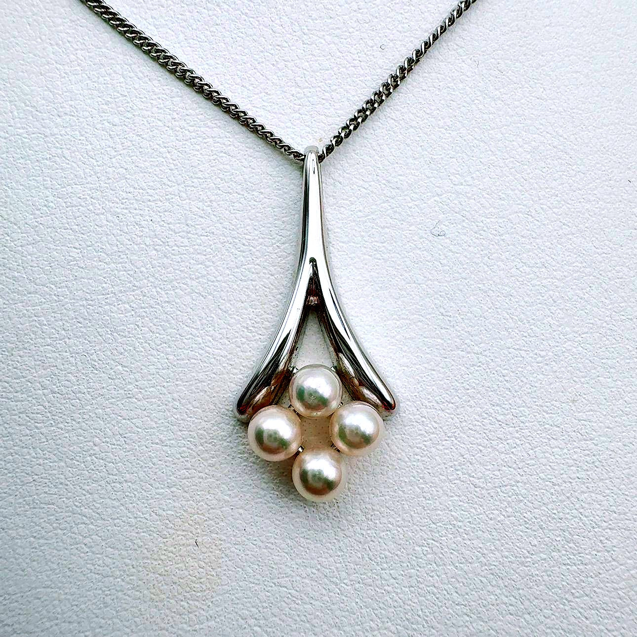 Mikimoto necklace with a 4.9mm baby pearl pendant and 40.5cm chain in silver tone