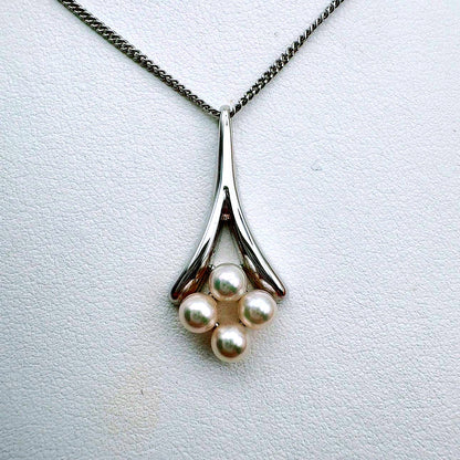 Mikimoto necklace with a 4.9mm baby pearl pendant and 40.5cm chain in silver tone