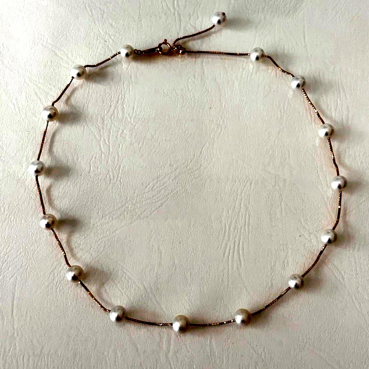 Tasaki K18 pearl necklace with 16 round beads, 44.5cm slide chain, pearls sized 6.5-7.0mm