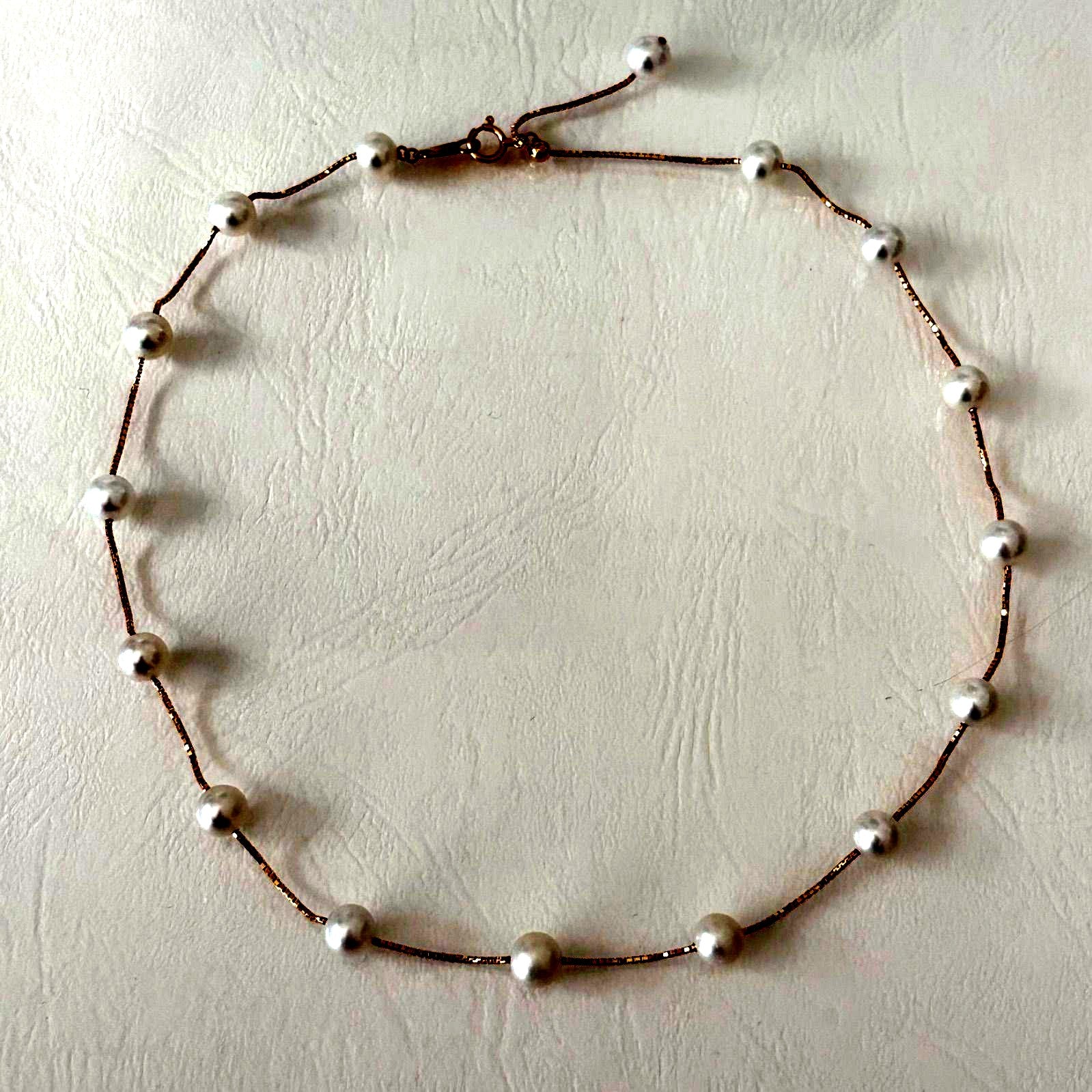 Tasaki K18 pearl necklace with 16 round beads, 44.5cm slide chain, pearls sized 6.5-7.0mm