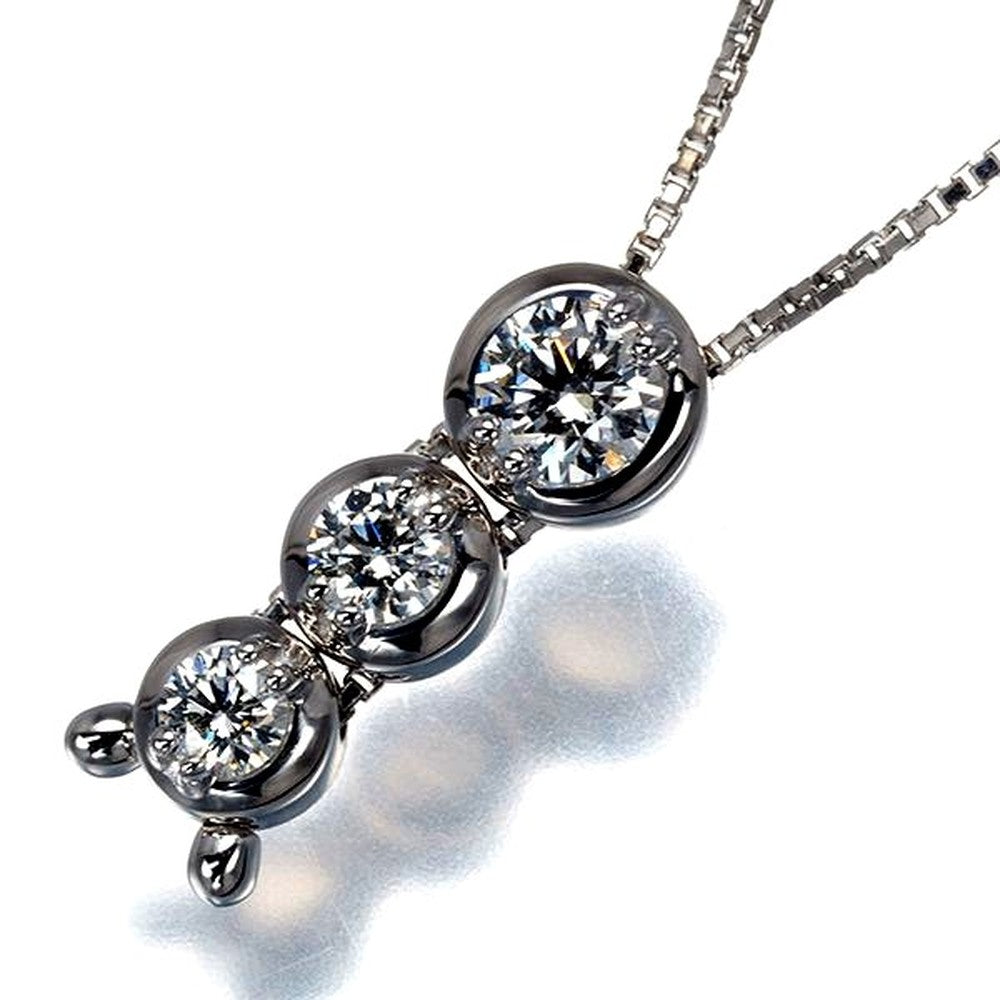 Tasaki diamond trilogy necklace 0.55ct set in 18k white gold with 51cm chain and 17.8x6.3mm pendant