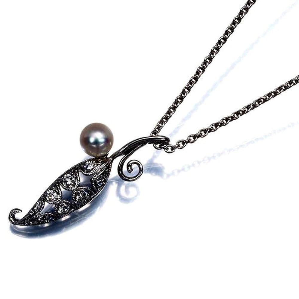Mikimoto necklace featuring 4.5mm baby Akoya pearl and diamond leaf design in 18K white gold, 39cm length