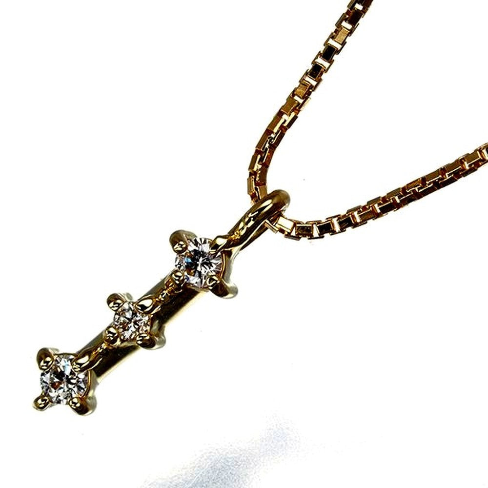 Tasaki 18K yellow gold necklace with three 0.05ct diamonds, 36 to 40 cm length, delicate 10x3.2 mm design