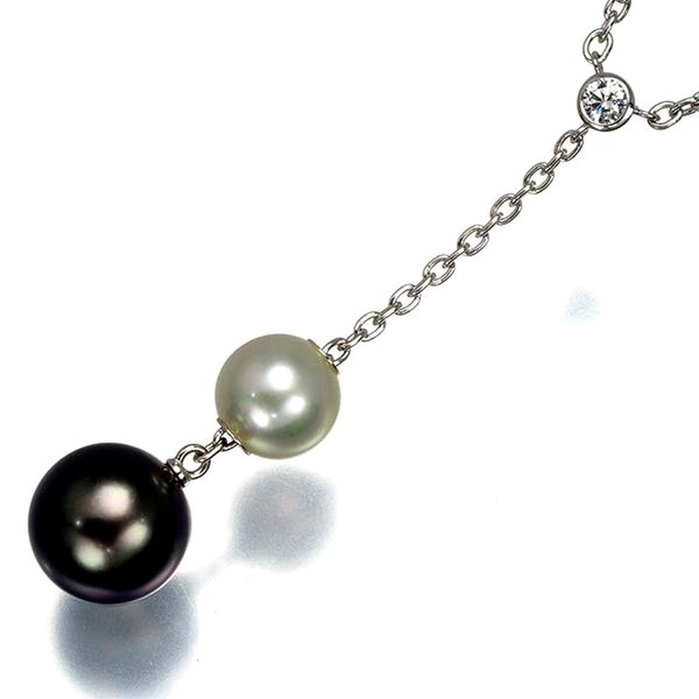 Mikimoto necklace with 9.4mm black pearl, 7.3mm Akoya pearl, diamonds, and white gold chain