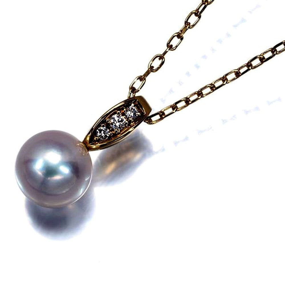 Mikimoto yellow gold necklace with 7.5mm pearl and single diamond pendant on 40cm chain