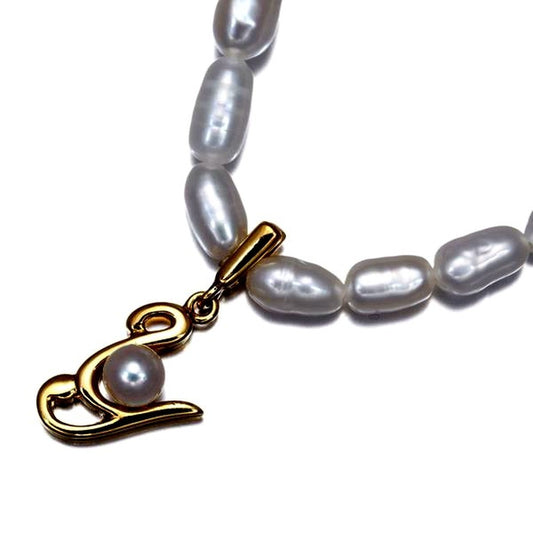 Mikimoto baby pearl necklace featuring 3.0-4.0mm freshwater pearls and a 3.7mm Akoya pearl initial Y pendant in 18k yellow gold