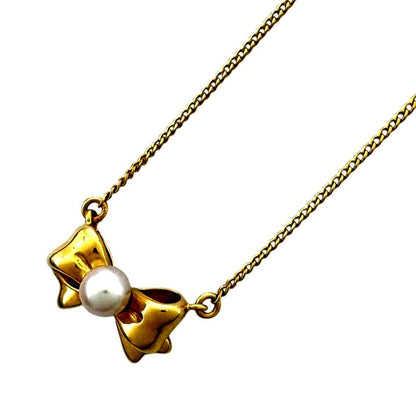 Tasaki Pearl Ribbon Necklace in 18K yellow gold with oval pearl and 39 cm chain